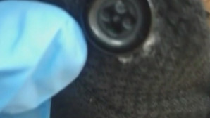 Düğme görünümlü kamera ile ehliyet sınavına girerken yakalandı